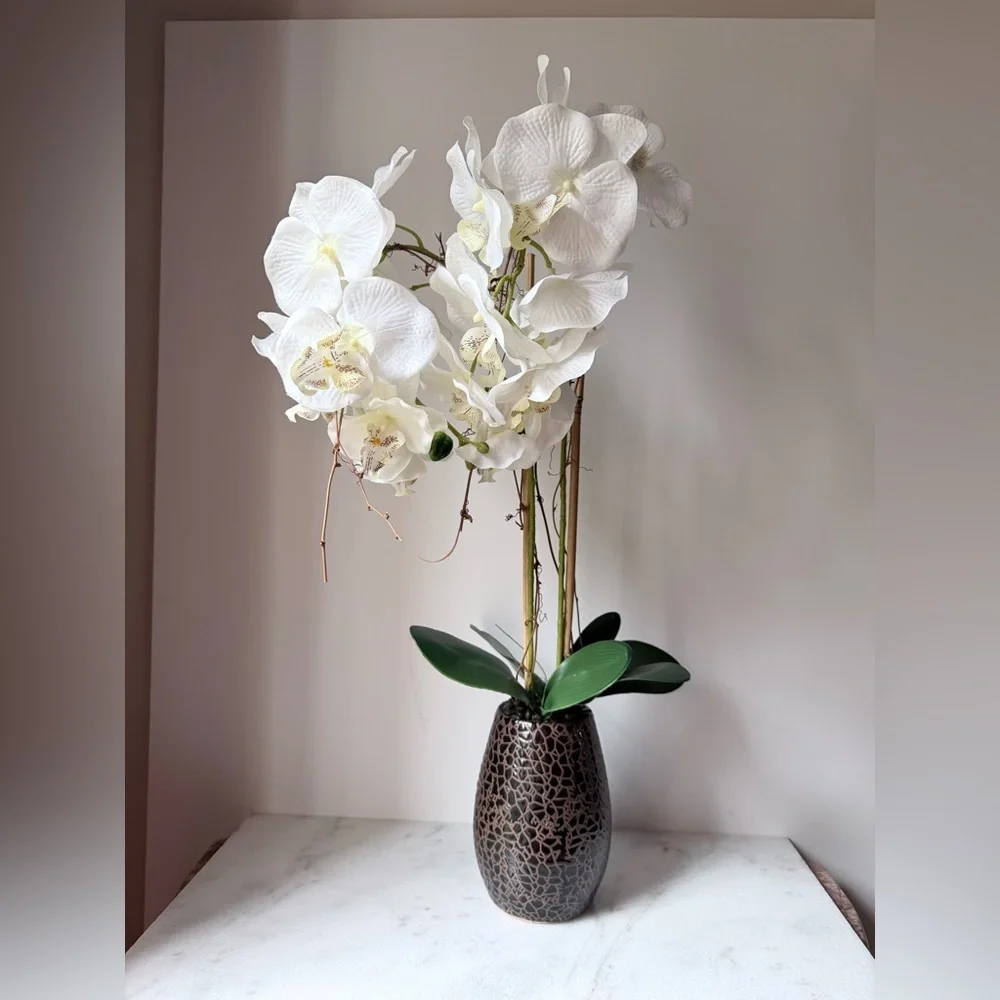 artificial white Phalaenopsis orchid arrangement in a brown textured vase 27”….